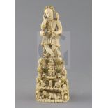 A 17th/18th century Indo-Goanese painted ivory group of Christ as the Good Shepherd, H.9.5in.