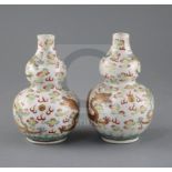 A pair of Chinese famille rose double gourd 'dragon' vases, Guangxu six character mark and of the