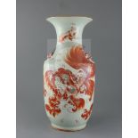 A Chinese iron red decorated 'Buddhist lion' vase, late 19th century, signed by Wang Yi Shun, with