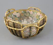 A fine Japanese Satsuma pottery basket moulded bowl, by Kinkozan, Meiji period, the exterior painted