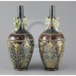 Frank A Butler for Doulton, a pair of Art Union of London bottle vases, c.1885, impressed marks