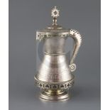 A 19th century Russian 84 zolotnik silver gothic style flagon, with engraved geometric decoration