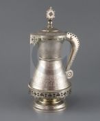 A 19th century Russian 84 zolotnik silver gothic style flagon, with engraved geometric decoration