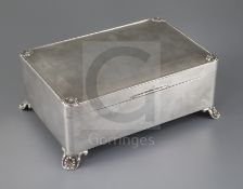 A George V Art Deco silver rectangular cigar box, by C.s. Green & Co, the engine turned lid with