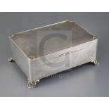 A George V Art Deco silver rectangular cigar box, by C.s. Green & Co, the engine turned lid with