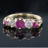 A gold, three stone ruby and two stone diamond set half hoop ring, in Tessier, Bond Street box, size