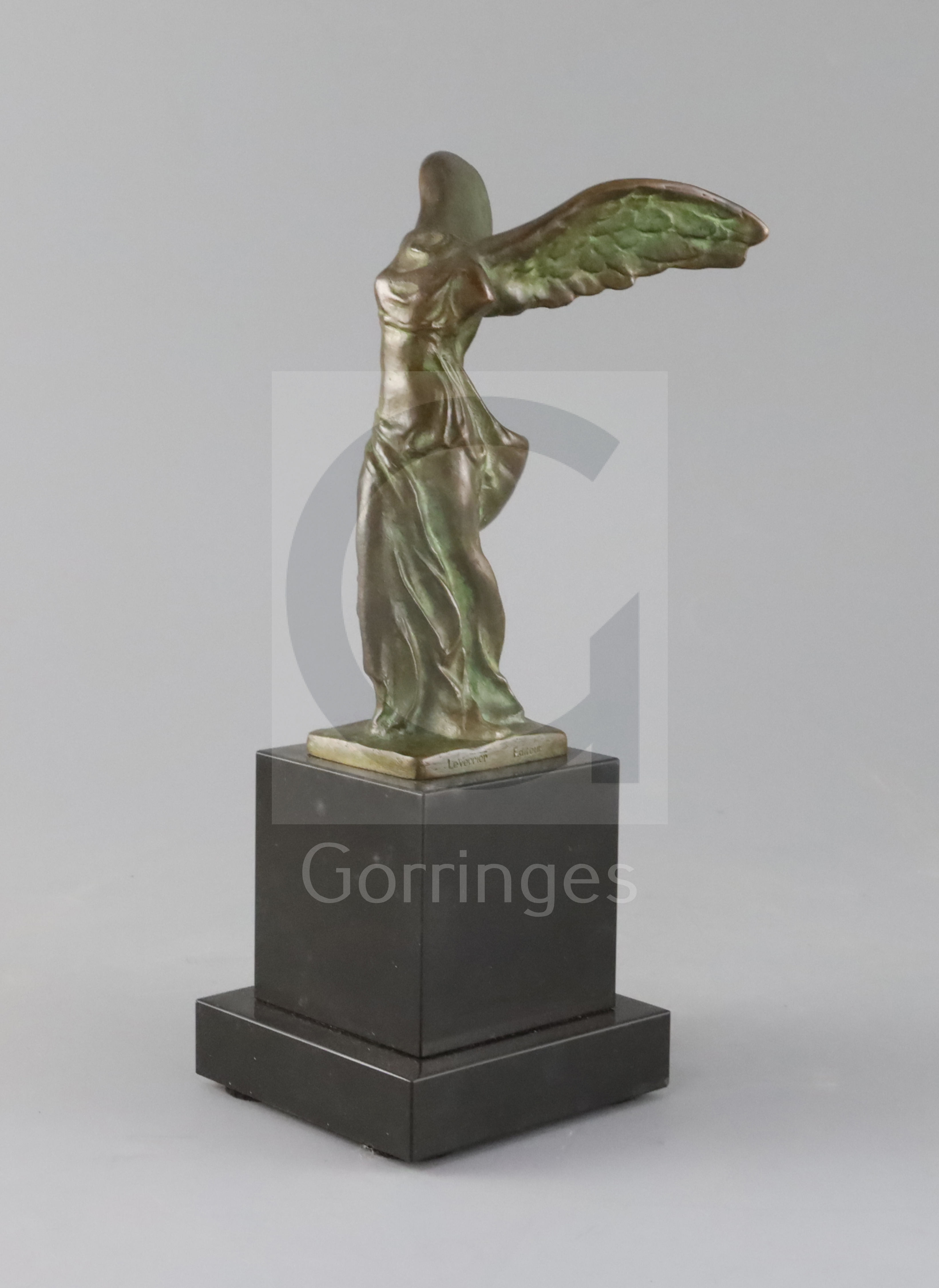Max Le Verrier (1891-1973). A bronze group 'La Victoire de Samothrace', on black marble plinth,