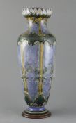 Eliza Simmance for Royal Doulton Lambeth, a tall lotus design vase, c.1910, decorated with panels of