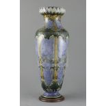 Eliza Simmance for Royal Doulton Lambeth, a tall lotus design vase, c.1910, decorated with panels of