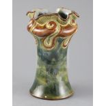 Frank A Butler for Doulton Lambeth, an organic free-form vase, c.1895, with scrolling neck,