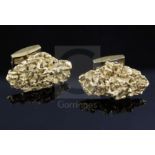 A pair of 1970's 18ct gold modernist cufflinks, of nugget form, cufflink head 29mm.