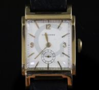 A gentleman's stylish 1930's? 14k gold Longines manual wind wrist watch, with raised lugs and