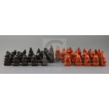An 18th century red and black lacquer Burmese figural chess set, kings 3in.