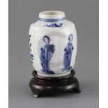 A Chinese blue and white small jar, Kangxi period, painted to the petal lobed body with ladies and