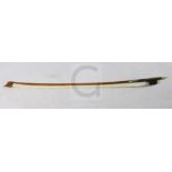 A nickel mounted cello bow, stamped 'Tubbs', the rounded stick appears to be of partridge wood, with