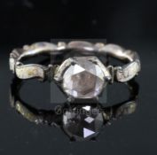 A George II gold, white enamel and rose cut diamond set mourning ring, with rock crystal panel en