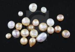 Twenty one loose undrilled natural pearls, gross weight 49.27cts, with accompanying Gem and Pearl