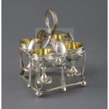 A George III silver open wirework egg cruet by Joseph Angell I, of square form, with four cups and