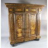 A 19th century Dutch walnut and marquetry armoire, with moulded pediment and two panelled doors