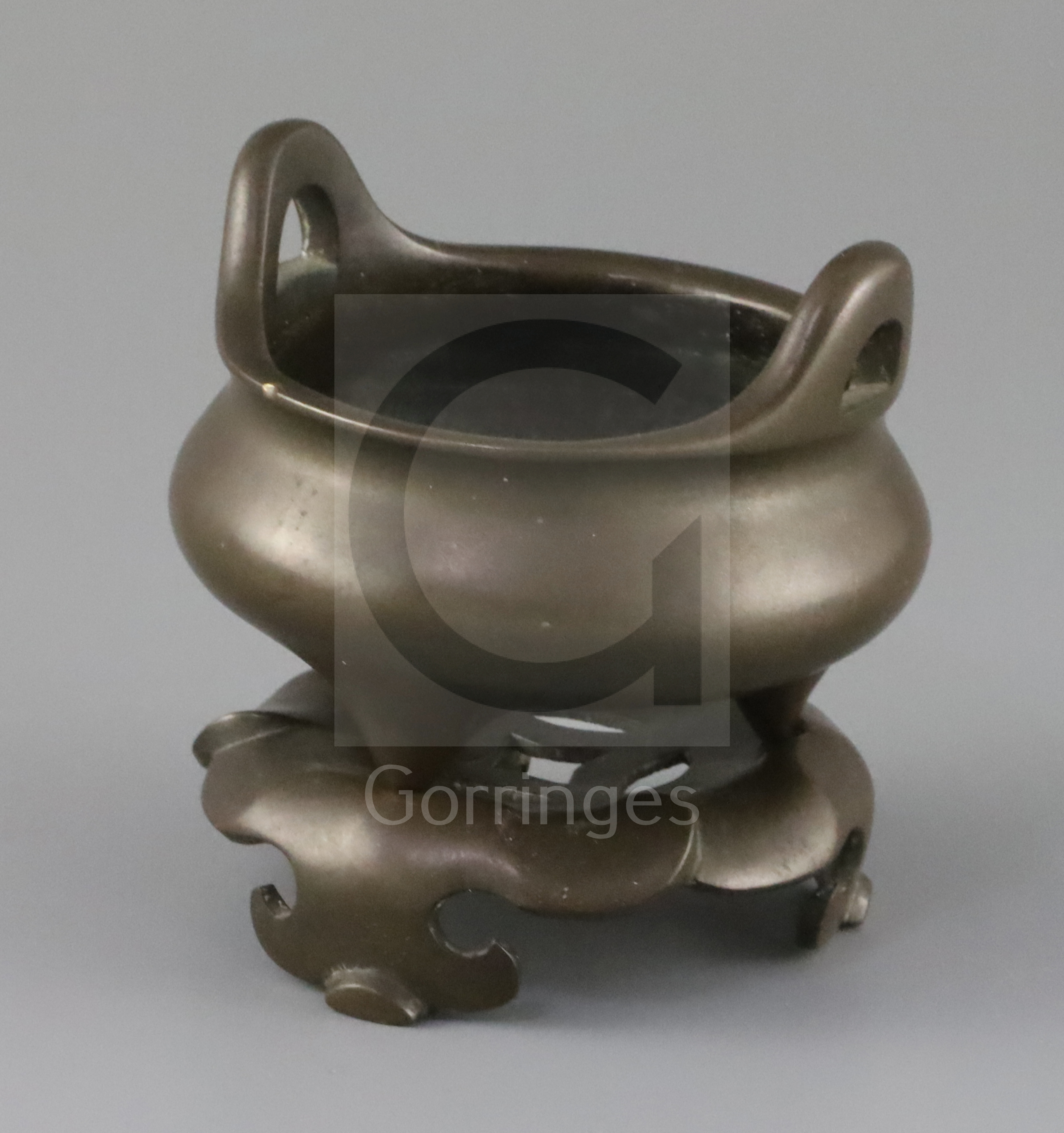 A Chinese bronze tripod censer and stand, Xuande mark but later Qing dynasty, the pierced stand with - Image 2 of 3