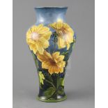 A Doulton Lambeth faience baluster vase, c. 1895, by Katharine B Smallfield, painted with sunflowers