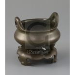 A Chinese bronze tripod censer and stand, Xuande mark but later Qing dynasty, the pierced stand with