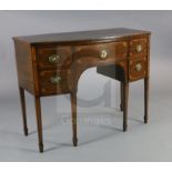 A George III inlaid mahogany bowfront sideboard, fitted five drawers, on squared tapered legs with