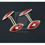 A pair of early 20th century 15ct, red and white enamel and diamond set navette shaped cufflinks.