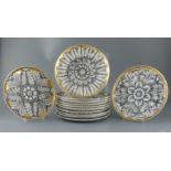 A set of twelve Fornasetti Rosoni pattern plates, black printed marks, Diam.26cm