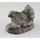 A Russian bronze figure of a reclining bear scratching its foot, 5in.