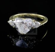 A 1980's Kutchinsky 18ct gold heart shaped diamond set dress ring with pear cut diamond set