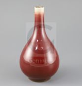 A Chinese sang de boeuf glazed langyao bottle vase, late 19th / early 20th century, H.19cm