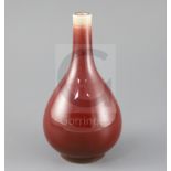 A Chinese sang de boeuf glazed langyao bottle vase, late 19th / early 20th century, H.19cm