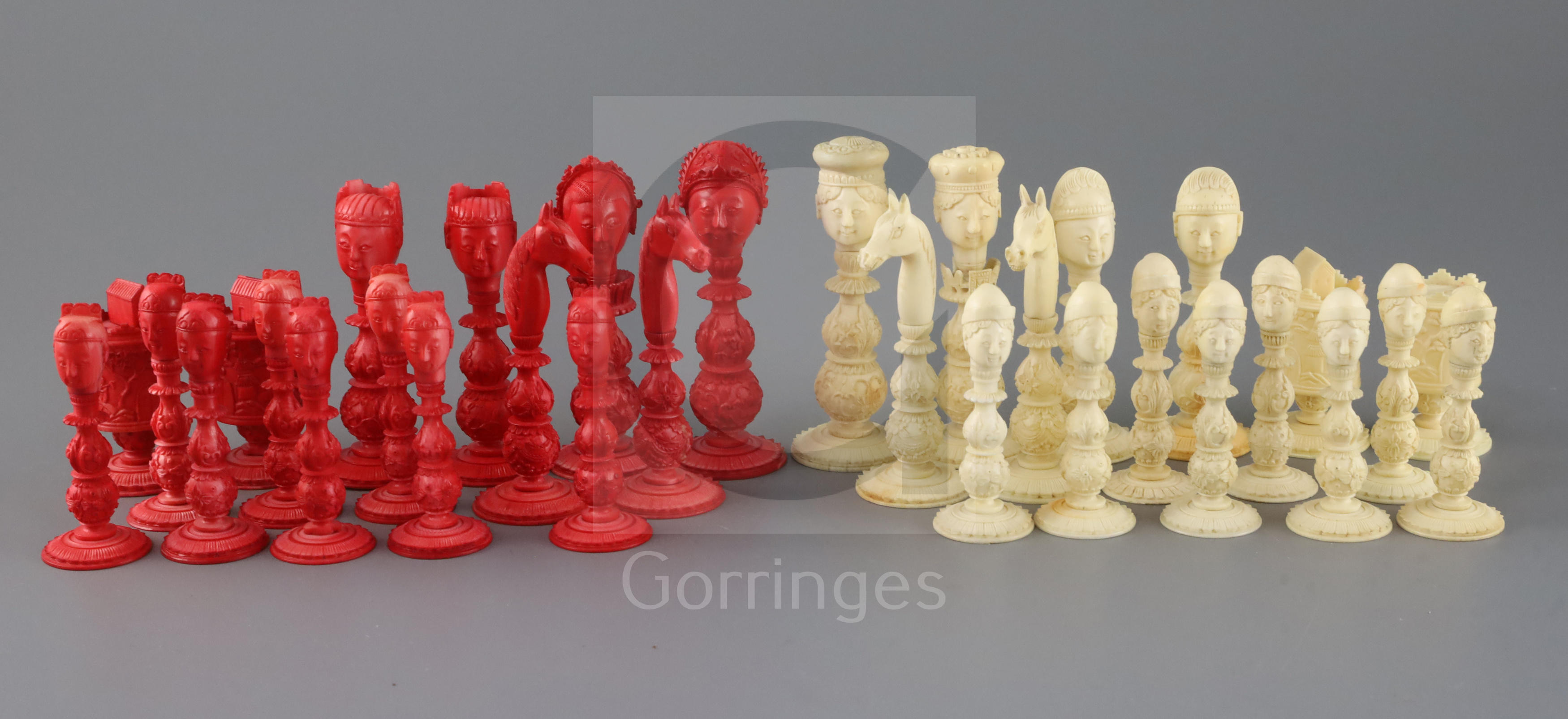 A mid 19th century Macao red stained and natural ivory figural chess set, European and Mongolian