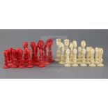 A mid 19th century Macao red stained and natural ivory figural chess set, European and Mongolian