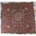 A 19th century Kashmiri handwoven silk shawl, woven with a design of figures, some on horseback,