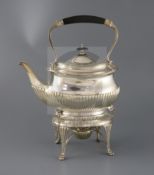 A late Victorian demi fluted tea kettle on stand and burner, by Edward Hutton, of shaped oval