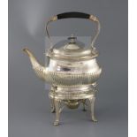 A late Victorian demi fluted tea kettle on stand and burner, by Edward Hutton, of shaped oval