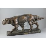 Thomas Francois Cartier (French, 1879-1943). A French bronzed terracotta model of a Gordon Setter,
