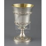 A George III silver pedestal cup or vase by Robert & Samuel Hennell, with bands of flowerheads in