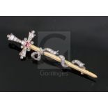 A late Victorian gold and silver, ruby, old and rose cut diamond set sword and ribbon bow brooch,