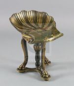 A 19th century parcel gilt green painted Venetian grotto style piano stool, with revolving scalloped