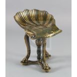 A 19th century parcel gilt green painted Venetian grotto style piano stool, with revolving scalloped