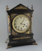 A Victorian ormolu mounted and ebonised chiming bracket clock, with architectural case and