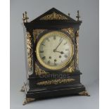 A Victorian ormolu mounted and ebonised chiming bracket clock, with architectural case and