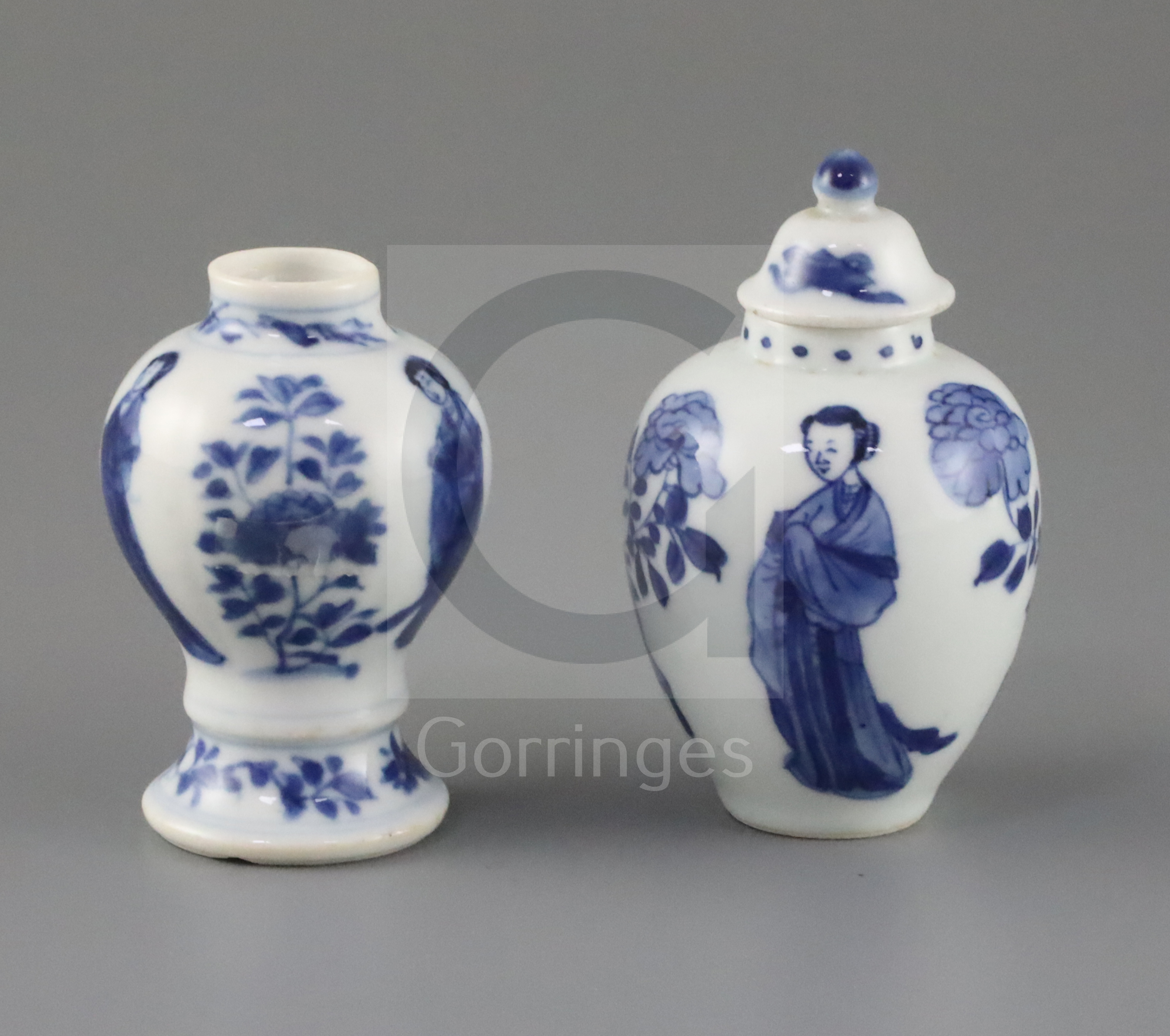 A Chinese blue and white small jar and cover, and a similar small vase, Kangxi period, each