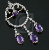 A late Victorian gold and silver, pear and round cut amethyst and rose cut diamond set openwork drop