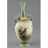 A good Royal Worcester small vase painted with a goldfinch by Ernest Barker, c.1911, of ovoid long-