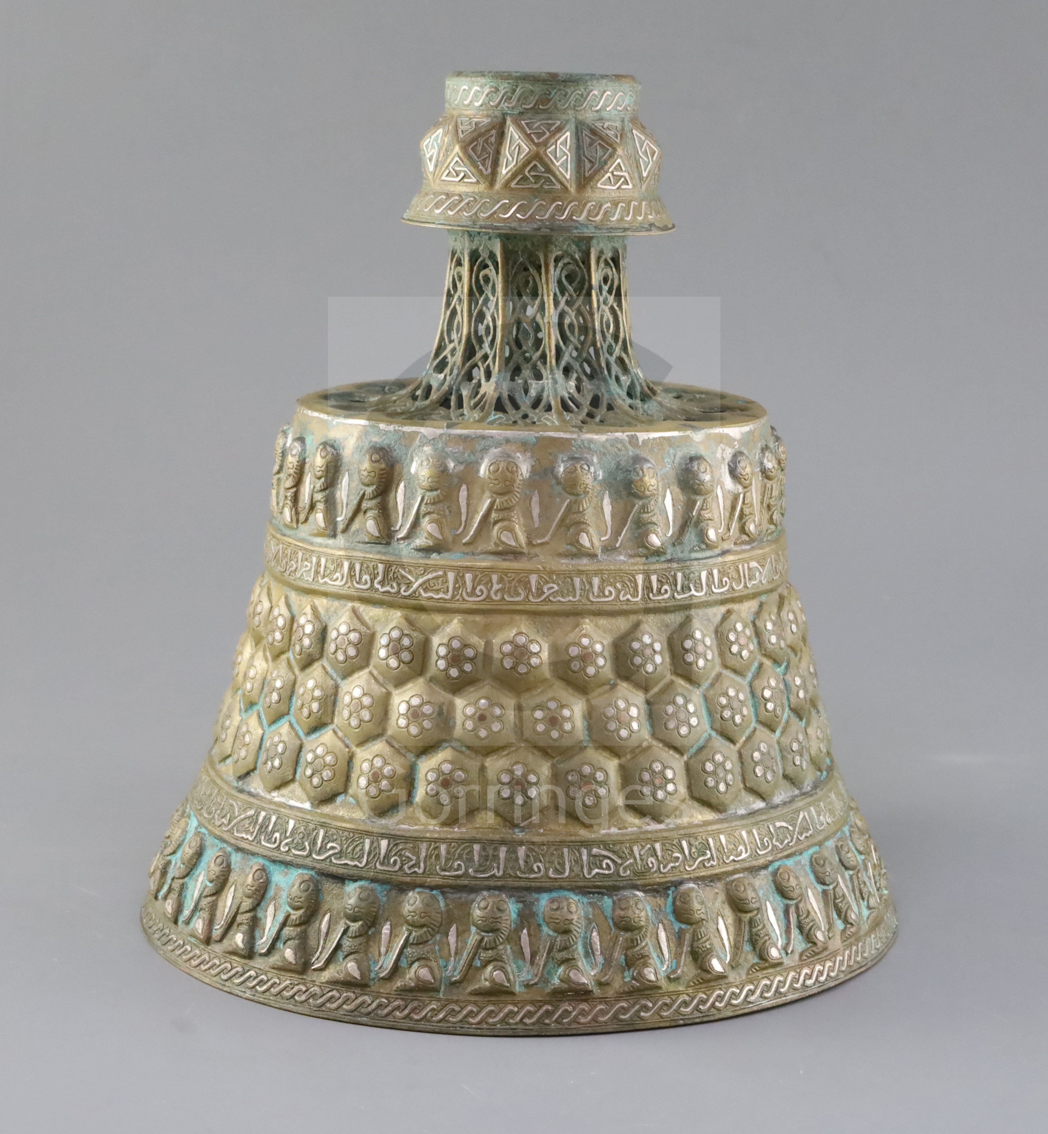 A 13th century Khorassan silver and copper inlaid bronze candlestick, of octagonal faceted truncated - Image 2 of 6