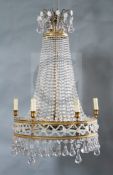 A French gilt metal and glass bag chandelier, hung with beaded and tier shaped drops, drop 3ft